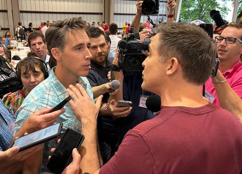 Hawley (left) recently confronted Kunce at the Missouri State Fair in an attempt to bait him.