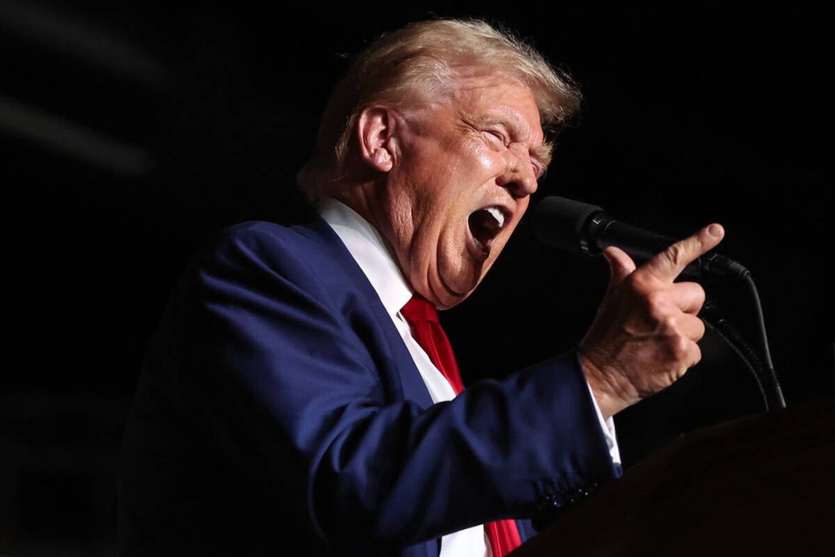 Donald Trump shouts "you're fired" while speaking during a campaign rally