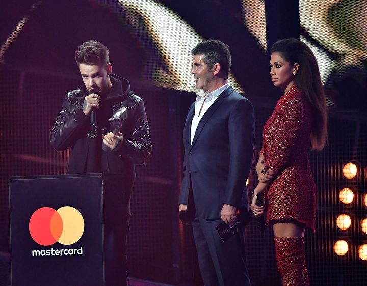 Liam Payne, Simon Cowell and Nicole Scherzinger appear at the 2017 Brit Awards. 