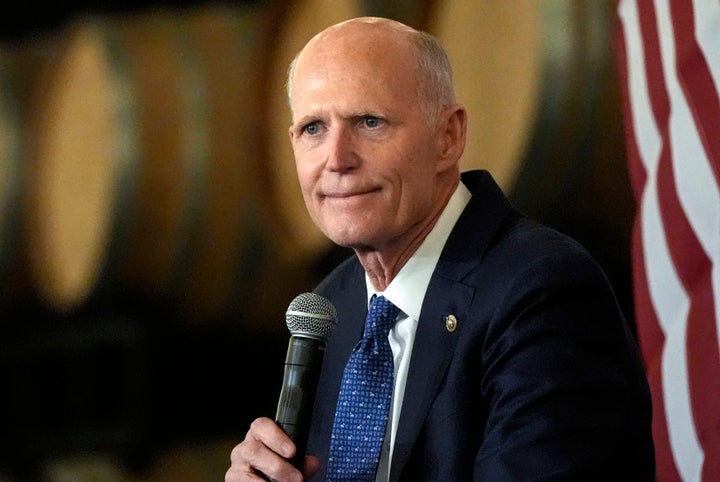 Sen. Rick Scott (R-Fla.), shown here at a Sept. 3 campaign event for Donald Trump in Braselton, Georgia, is facing blame in his reelection campaign for the homeowners insurance crisis in Florida.