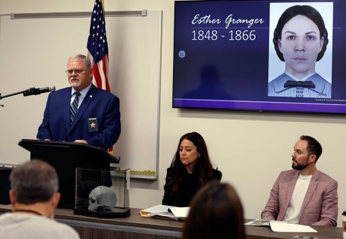 Kane County Coroner Rob Russell is pictured with an artist's rendering of the likeness of Esther Granger as he speaks during a press conference Thursday, Oct. 24, 2024 in St. Charles, Illinois.