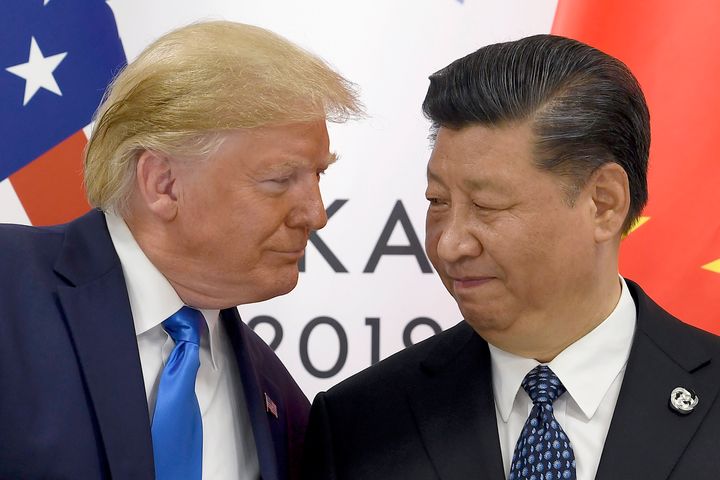 Then US President Donald Trump, left, meets with Chinese President Xi Jinping during a meeting on the sidelines of the G-20 summit in Osaka, Japan, 2019.