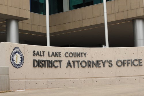 A photo shows the Salt Lake County District Attorney's Office in Utah.