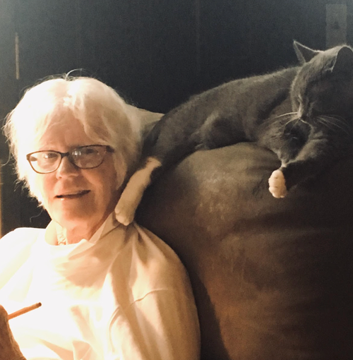 The author's mom doing a crossword puzzle. "This was the day after we found out her cancer was back," the author writes.