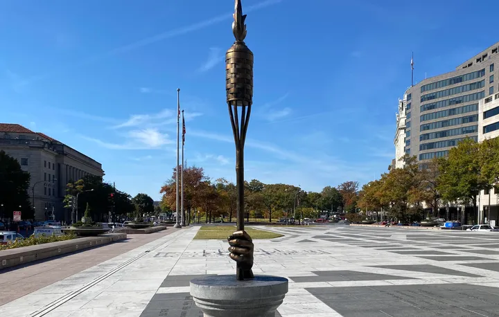 Tiki torch statue