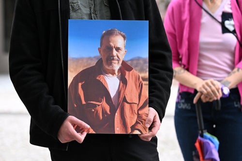 A demonstrator holds a picture of Iranian-German Jamshid Sharmahd, who has been sentenced to death in Iran, during a demonstration for his release in front of the German Foreign Ministry in Berlin on July 31, 2023. Sharmahd was abducted three years ago in late July 2020 by the Iranian authorities and sentenced earlier this year to be hanged for "corruption on earth". Iran's Supreme Court in April confirmed the death penalty. (Photo by INA FASSBENDER / AFP) (Photo by INA FASSBENDER/AFP via Getty Images)