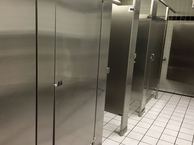 Doors to bathroom stalls offering choice