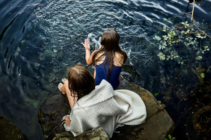 "My daughters get comfortable with the nakedness right away, perhaps because there are so many kinds of naked people: young kids like them, trans people, middle-aged folks like me, gay couples, and plenty of older folks, some of whom have been making the pilgrimage since they were young," author Jess D. Taylor writes.