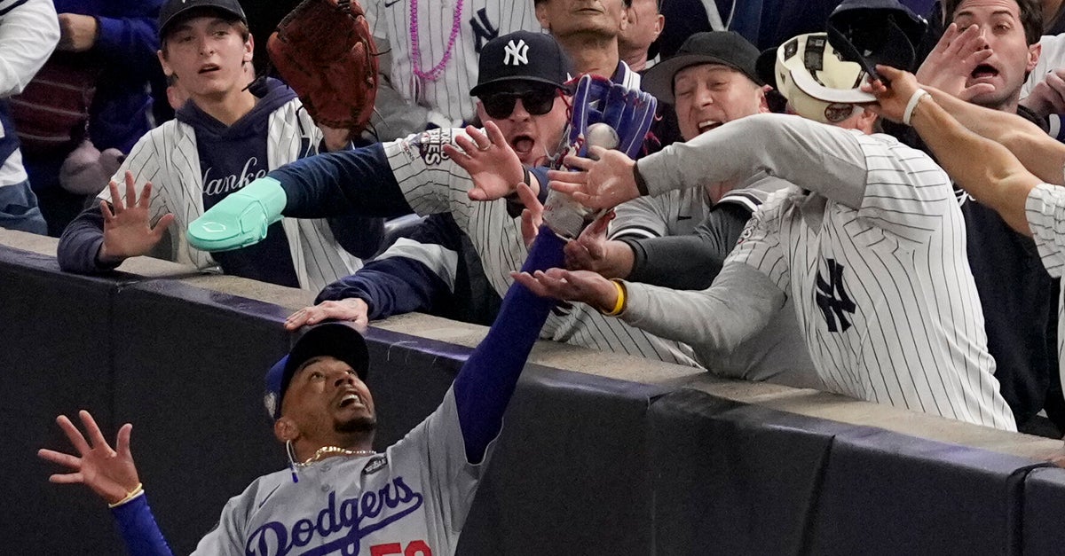 NextImg:Yankee Stadium Fan Ejected For Prying Ball Out Of Mookie Betts' Glove At World Series