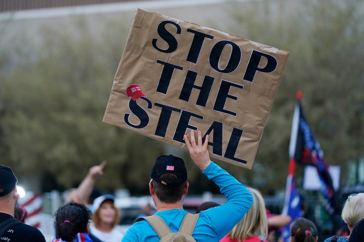 Supporters of President Donald Trump rally outside the Maricopa County Recorder's Office, Nov. 6, 2020, in Phoenix.