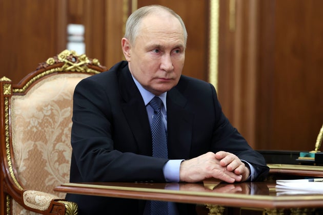 Russian President Vladimir Putin speaks during a meeting with Science and Higher Education Minister Valery Falkov at the Kremlin.