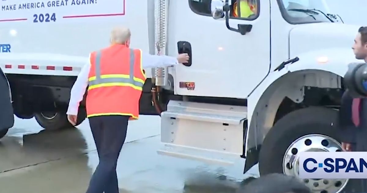 Trump Nearly Face-Plants On A Garbage Truck During A Trashy Photo-Op