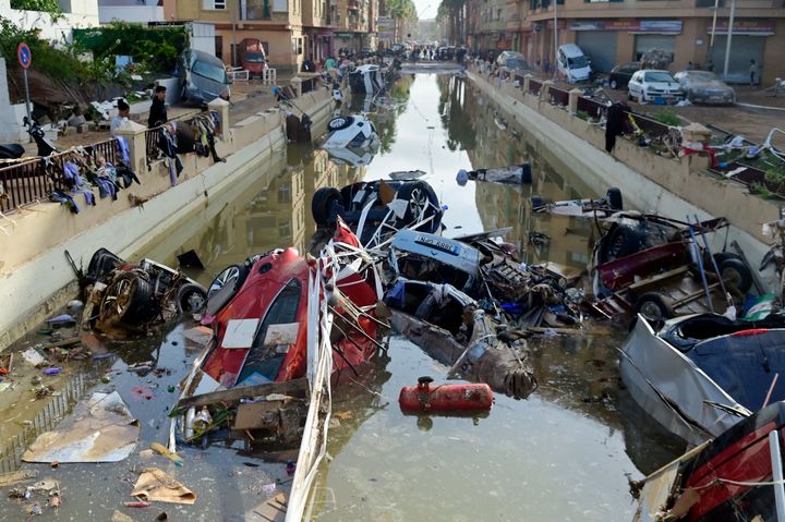 Wreckage of cars remain submerged in the water after flash floods affected the town of Alfafar, in the region of Valencia, eastern Spain