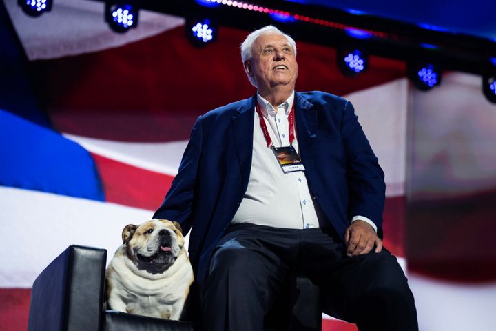 West Virginia Gov. and Senate candidate Jim Justice and his English bulldog, Babydog, are seen on the second day of the Republican National Convention on July 16.