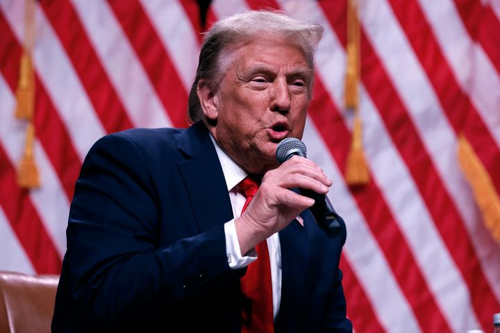 Republican presidential nominee, former President Donald Trump sits down for a conversation with Tucker Carlson during his Live Tour at the Desert Diamond Arena on October 31, 2024 in Phoenix, Arizona.