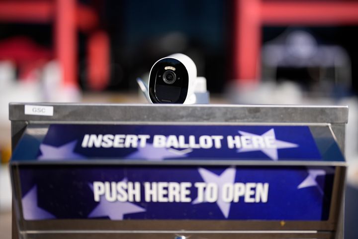 A security camera watches over a mail-in ballot drop box outside the Chester County Government Services Center ahead of the 2024 General Election in the United States, Friday, Oct. 25, 2024, in West Chester, Pa. (AP Photo/Matt Slocum)