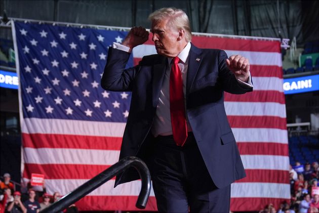 Republican presidential nominee former President Donald Trump dances at a campaign rally at First Horizon Coliseum, Saturday, Nov. 2, 2024, in Greensboro, N.C. (AP Photo/Evan Vucci)