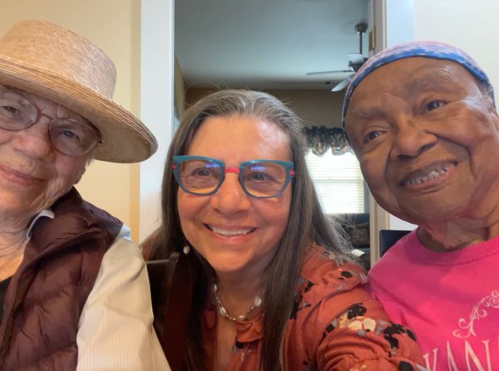 The author (center) with Helen (left) and James Ella (right) in May 2024.