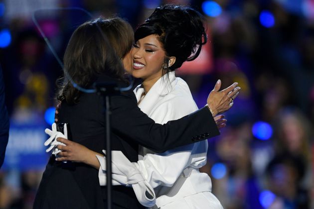 Kamala Harris and Cardi B share a hug on stage in Milwaukee on Fri