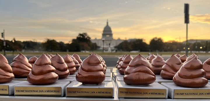 Rows of mini poop statues, left out as free souvenirs for people passing by the satirical monument in Washington, D.C. "honoring" Donald Trump and his supporters for the Jan. 6, 2021, insurrection.