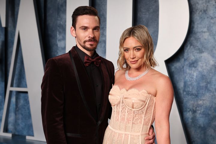 Matthew Koma and Hilary Duff attend the 2023 Vanity Fair Oscars party.