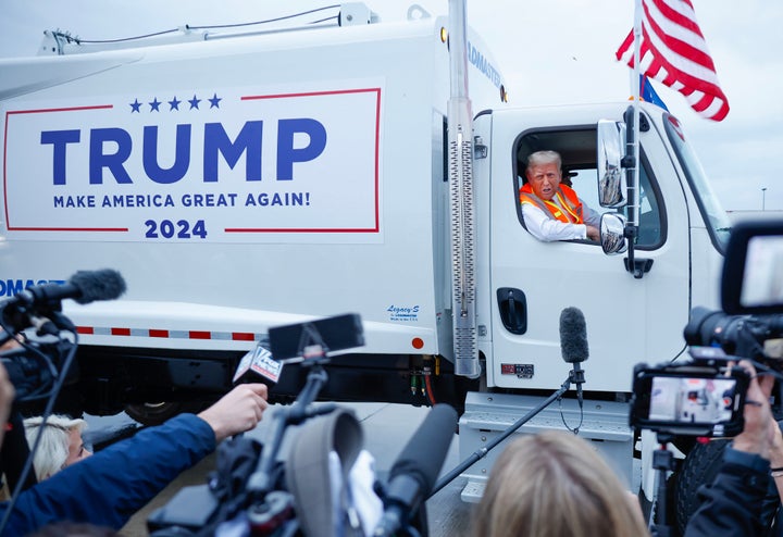 Former President Donald Trump holds a press conference from inside a trash hauler on Oct. 30, 2024, in Green Bay, Wisconsin.