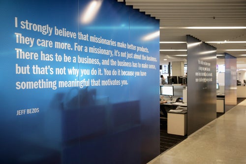 A quote from Bezos, the owner of The Washington Post, is seen displayed on a glass wall in the newspaper's Washington, D.C., newsroom in 2016.