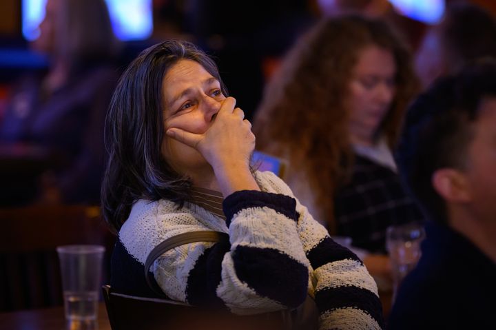 Supporters of Democratic presidential nominee, U.S. Vice President Kamala Harris, react as results are displayed during a "Democrats Abroad" election party on November 06, 2024 in London, England.