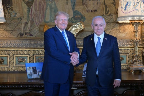 Donald Trump shakes hands with Israeli Prime Minister Benjamin Netanyahu during a meeting at Mar-a-Lago estate in Palm Beach, Florida, on July 26, 2024.