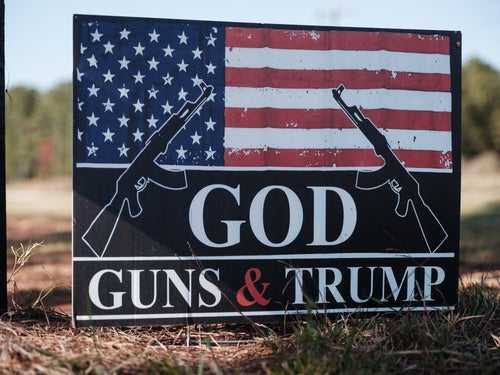 A placard supporting guns and Donald Trump, now the president-elect, is displayed Oct. 25 at the entrance of a farm in Forsyth, Georgia.