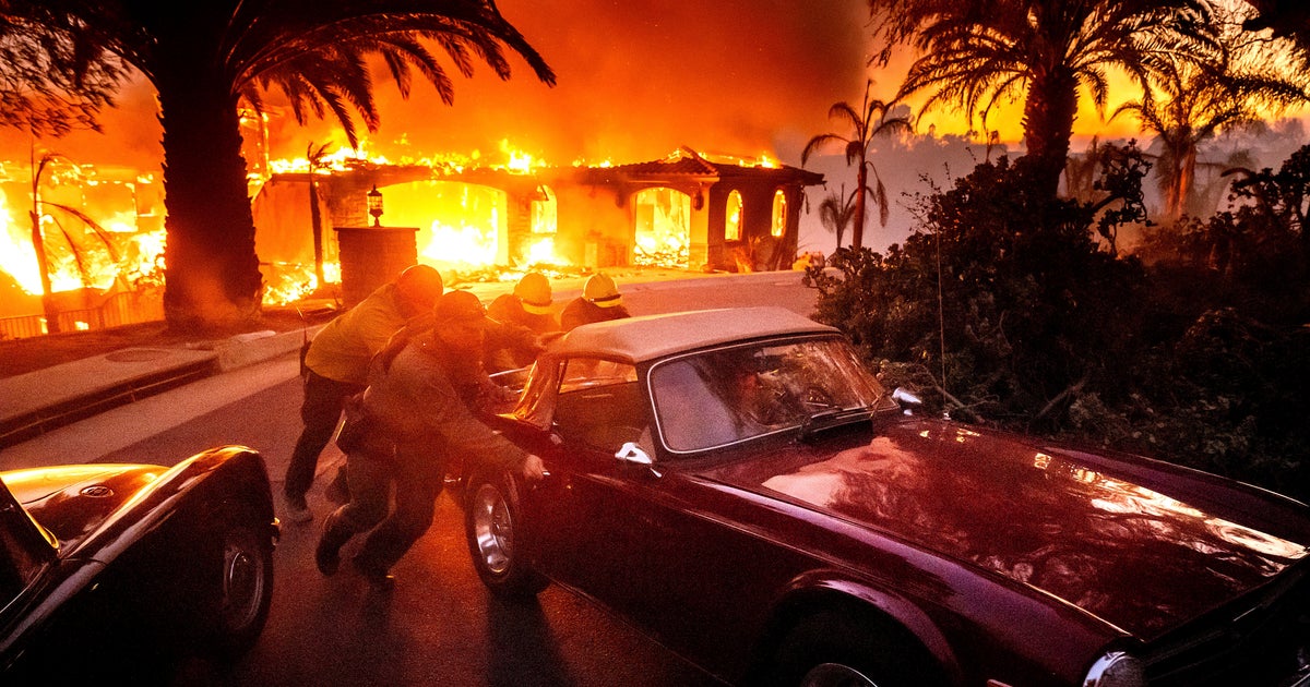 NextImg:Thousands Ordered To Evacuate As Wind-Fed Wildfire Burns Homes In Southern California