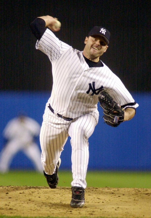 Roger Clemens, pictured pitching in a 2000 playoff game, snarked at voters who declared they would leave the U.S. if Trump won.