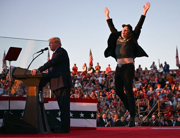 Elon Musk, jumping jubilantly behind Trump during a rally last month in Butler, Pennsylvania.