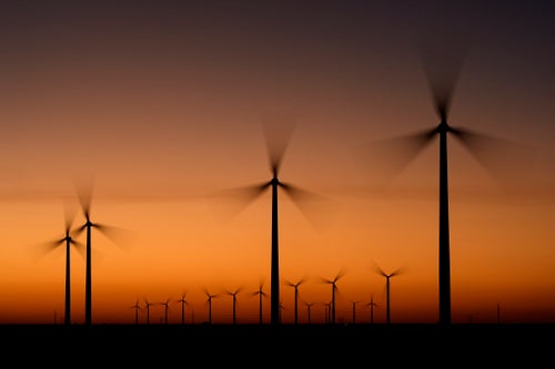 Wind turbines stretch across the horizon at dusk at the Spearville Wind Farm, Sunday, Sept. 29, 2024, near Spearville, Kansas. According to an agency that monitors warming trends, this year is on track to exceed 2023 as the warmest on record after a blistering October.