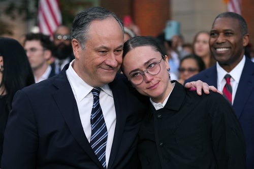 During her stepmom's concession speech, Ella Emhoff was comforted by her father, second gentleman Doug Emhoff.