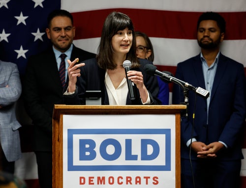 Rep. Marie Gluesenkamp Perez (D-Wash.) welcomes new Latino members of Congress at an event in 2022.