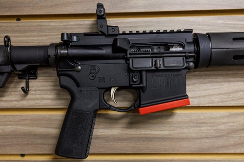 A Springfield Armory AR-15-style rifle on the wall at Voodoo Firearms on Jan. 24, 2023, in Minooka, Illinois. 