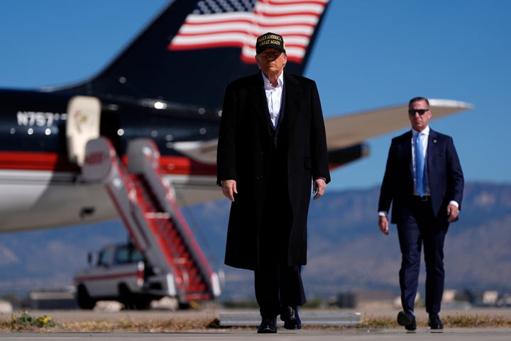 Republican presidential nominee former President Donald Trump arrives at a campaign rally at Albuquerque International Sunport, Thursday, Oct. 31, 2024, in Albuquerque, N.M. (AP Photo/Julia Demaree Nikhinson)