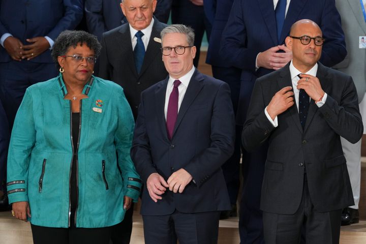 Keir Starmer with Barbados prime minister Mia Mottley and Simon Stiell, United Nations climate chief, at the COP29 climate summit.