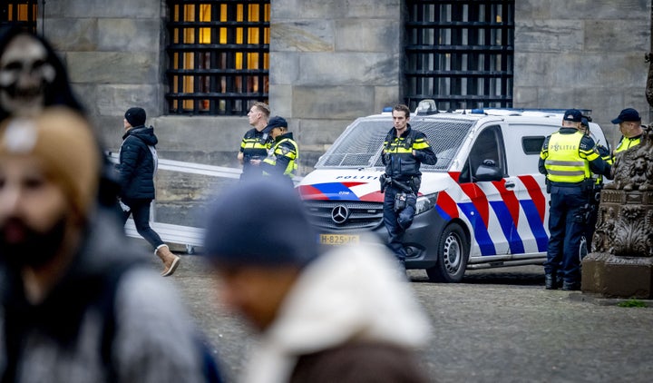 Netherlands' Police officers patrol on Dam Square in Amsterdam, on November 9, 2024. Extra security measures were taken in Amsterdam following violent clashes on November 7, 2024, between fans of Ajax, Maccabi Tel Aviv and Turkish club Fenerbahce, who were playing another Dutch club, AZ Alkmaar. (Photo by Robin Utrecht / ANP / AFP via Getty Images)