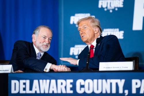 Mike Huckabee speaks with Donald Trump at a community roundtable held at The Drexelbrook Catering & Event Center in Delaware County in Drexel Hill, PA on Tuesday, Oct. 29, 2024.