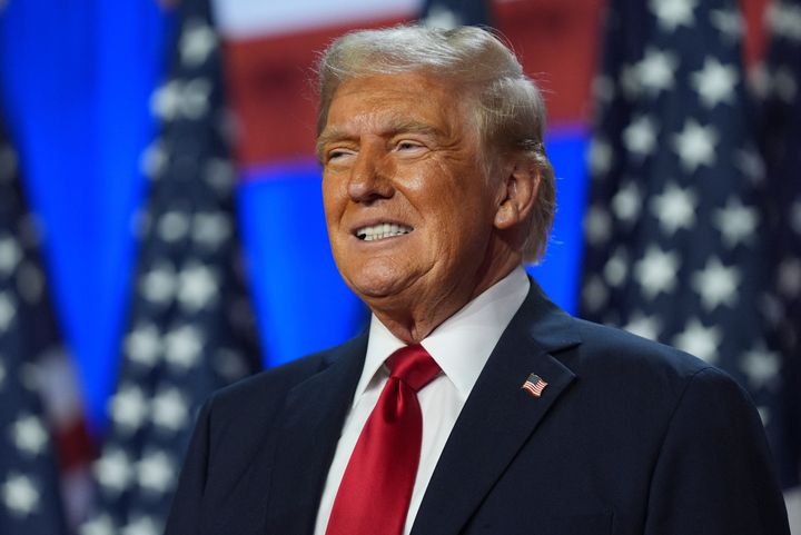  Donald Trump smiles at an election night watch party at the Palm Beach Convention Center, Wednesday, Nov. 6, 2024