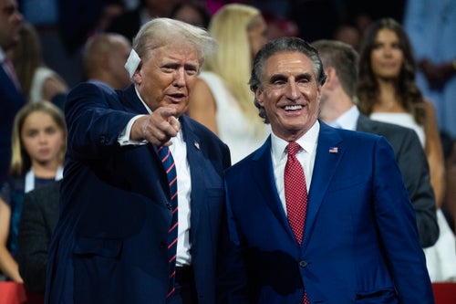Former President Donald Trump, the Republican presidential nominee, talks with North Dakota Gov. Doug Burgum in the Fiserv Forum on the third day of Republican National Convention in Milwaukee, Wis., on Wednesday, July 17, 2024. 