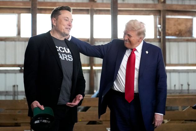 Elon Musk, left, and Republican presidential nominee former President Donald Trump attend a campaign event at the Butler Farm Show on Oct. 5, 2024, in Butler, Pa. 