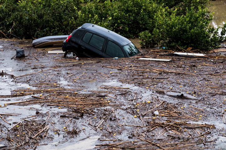 Cars are being swept away by the water, after floods preceded by heavy rains caused the river to overflow its banks in the town of Alora, Malaga.