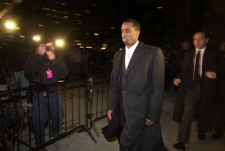 Combs leaves the state Supreme Court in Manhattan on Jan. 29, 2001, after the first day of his trial for possession of a weapon following a shooting at a nightclub in 1999.