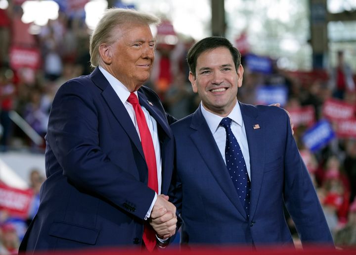 Republican presidential nominee former President Donald Trump greets Sen. Marco Rubio, R-Fla., during a campaign rally at J.S. Dorton Arena, Nov. 4, 2024, in Raleigh, N.C. 