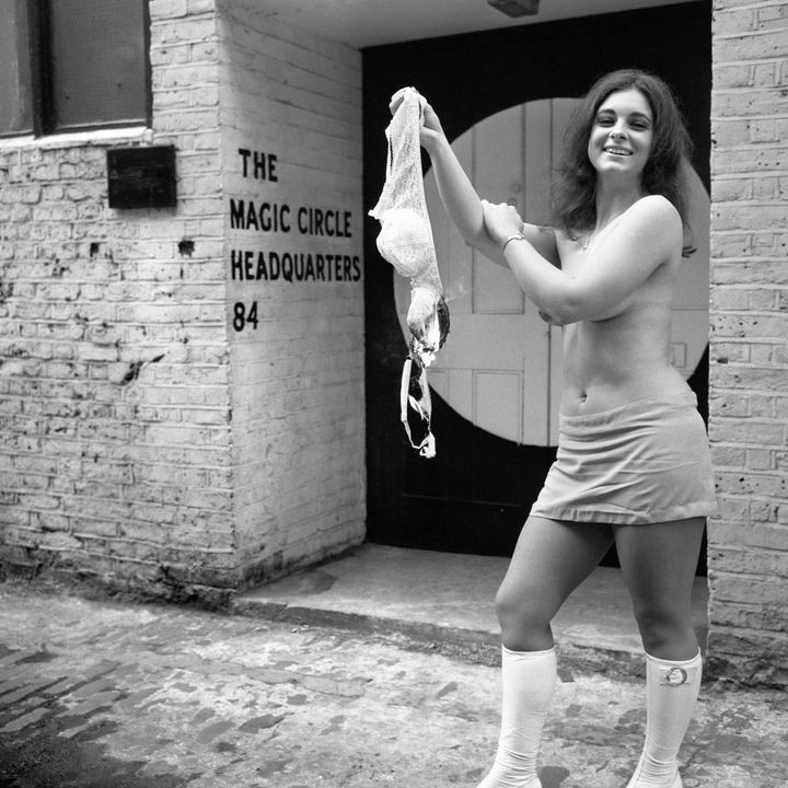 Diane Matthews, 23, protests in 1972 against sex discrimination by burning her bra outside The Magic Circle in Chenies Mews, London, after being told that only men were eligible to joine.