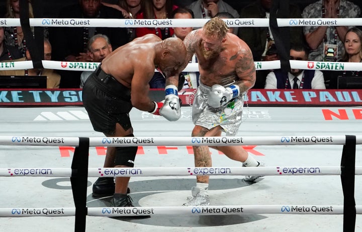 Tyson and Paul fight during their heavyweight boxing bout.