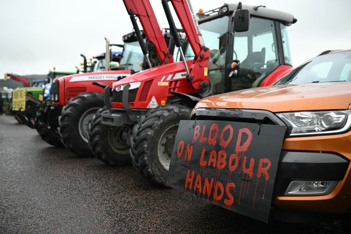 Tractors and farm vehicles are seen lined up outside the venue of the Welsh Labour Party conference in Llandudno, north-west Wales on November 16, 2024